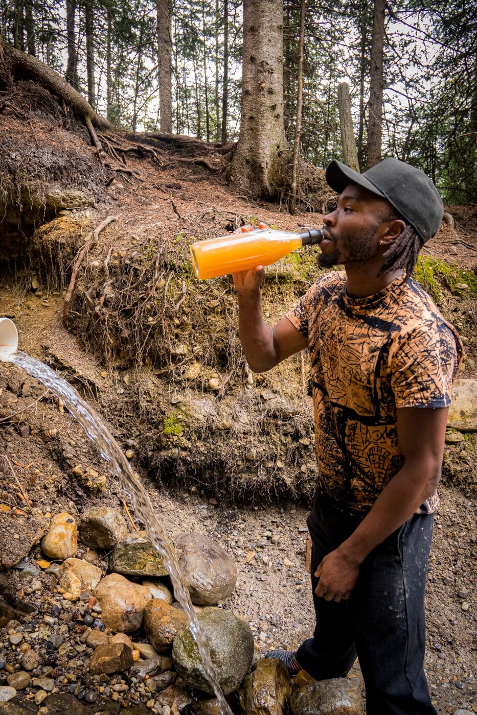 Gabriel drinking from the spring